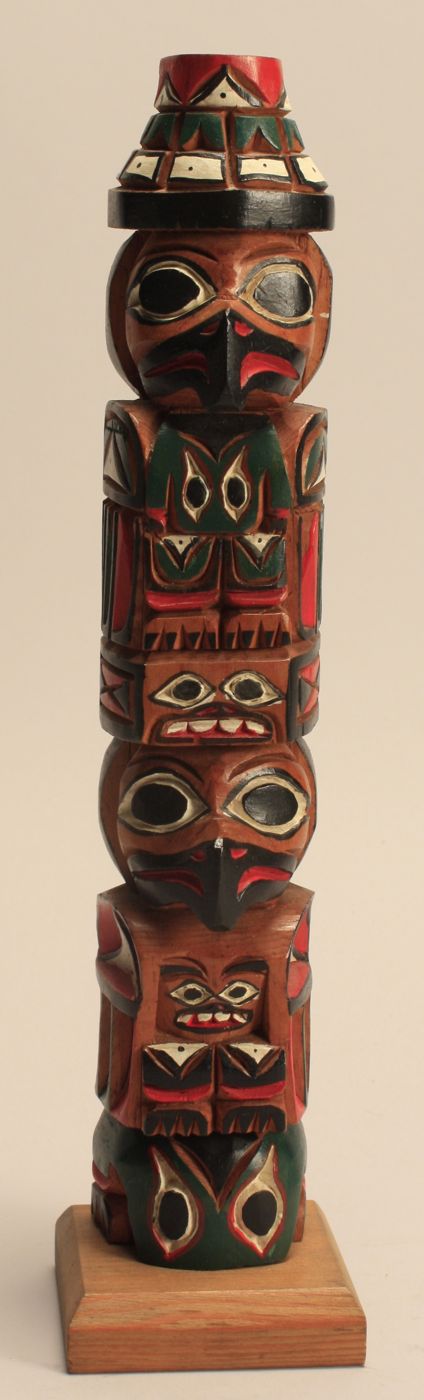 CARVED AND POLYCHROME TOTEMBy Eric