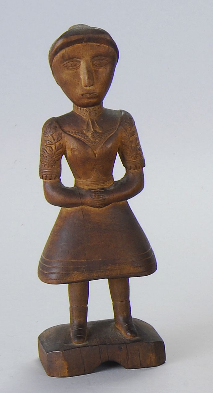 CARVED WOOD FIGURE OF A GIRLPossibly 14a802