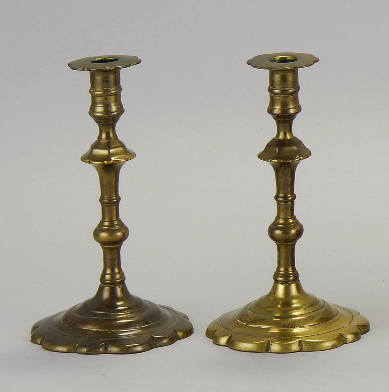 PAIR OF EARLY QUEEN ANNE BRASS