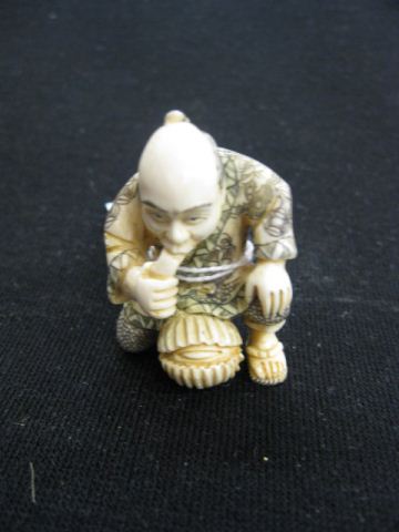 Carved Ivory Netsuke of Maneating