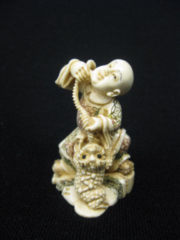 Carved Ivory Netsuke of Child &