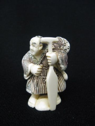 Carved Ivory Netsuke of a Man with 14d2b4