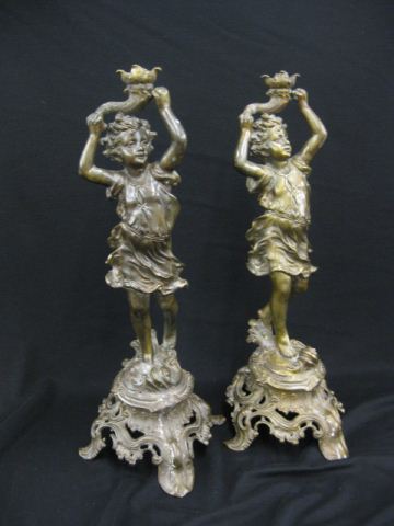 Pair of Bronzed Figural Candlesticks