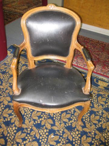 French Arm Chair carved black leather.
