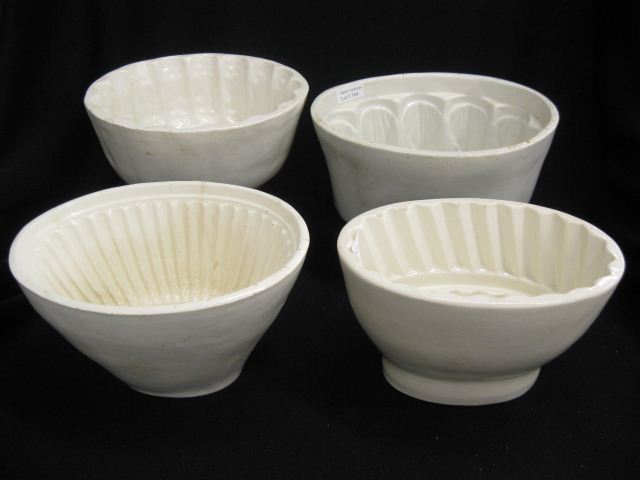 4 Early Pottery Food Molds.
