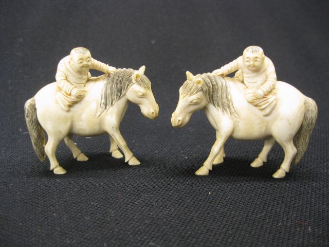 Pair of Chinese Carved Ivory Figurinesof