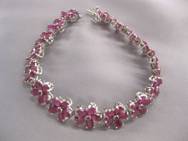 Ruby Bracelet 80 oval and 32 round gems