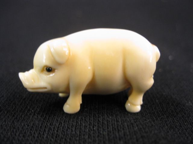 Carved Ivory Figurine of a Pig signed