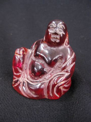 Carved Cherry Amber Figurine of