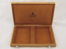 Faberge. A suede lined oak box for twenty