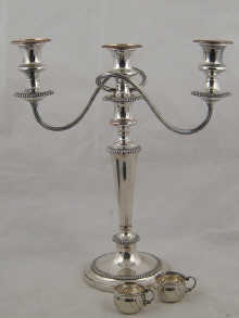 A silver plate three light candelabrum