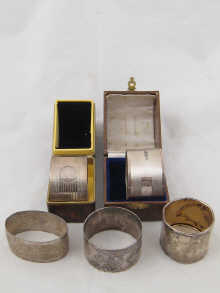 Five silver napkin rings being