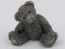 A hallmarked silver teddy bear