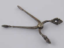A pair of silver sugar tongs by George