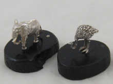 A silver model of an elephant together 14d95b