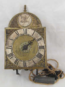 An unusual 18th c. lantern clock