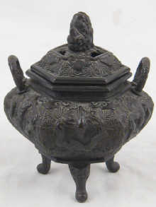 An ornate hexagonal bronze incense 14d9bb