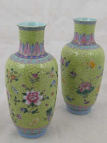 A pair of Chinese vases in the famille