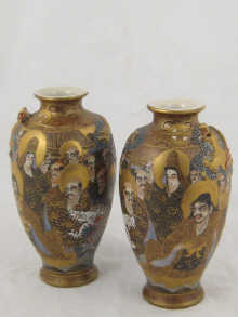 A pair of Satsuma vases each decorated