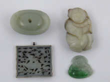 Four Chinese jade pieces all pierced 14d9e6