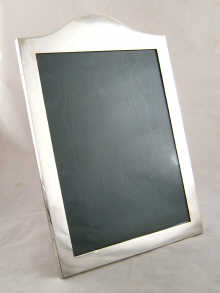 A large Victorian silver photo frame