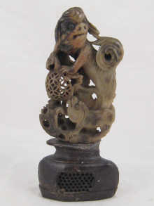 An oriental soapstone carving of