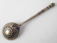 A Russian silver and enamel spoon