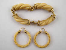 A suite of ivory and yellow metal 14da45