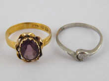 A 22 carat gold ring set with an