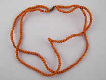 A double row coral bead necklace 14da57