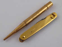 A pocket knife with 18 carat gold sides