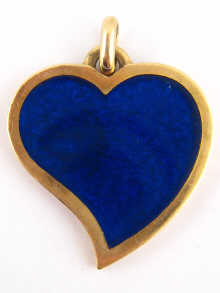A 9 carat gold asymmetrical heart