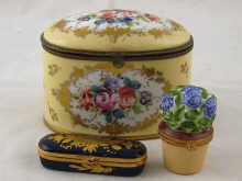 Three pieces of limoges porcelain being