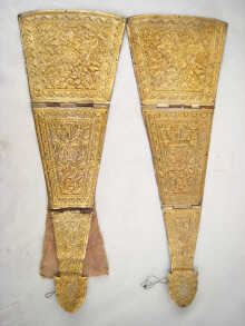A pair of copper backed intricately
