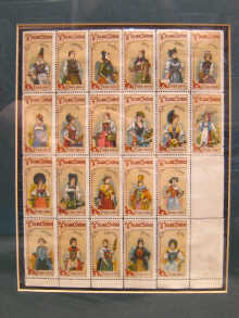 A framed and glazed sheet of stamps