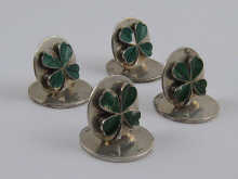 A set of four silver green enamelled 14dd8e