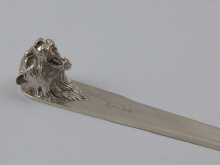 A modern silver letter opener with cast