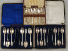 A set of six teaspoons and tongs 14dddb