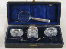 A boxed silver mounted cut glass