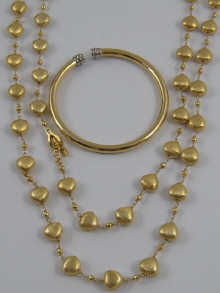 A hallmarked silver gilt necklace