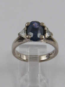 A sapphire and diamond ring the