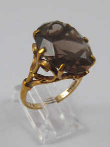 A 9 ct. gold dress ring set with