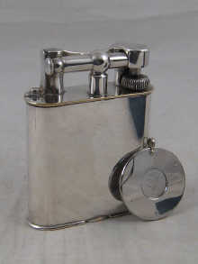 A plated Dunhill petrol table lighter