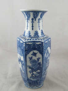 A tall Chinese blue and white vase
