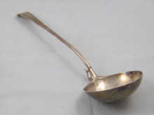 A Georgian silver soup ladle with 14de95
