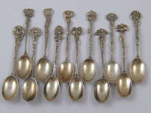 A set of twelve silver demitasse coffee