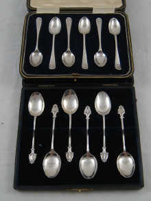 Two boxed sets of six silver coffee