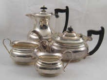 A four piece Queen Anne style silver