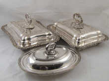 A pair of silver plate entree dishes