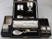 A silver christening set comprising 14decc